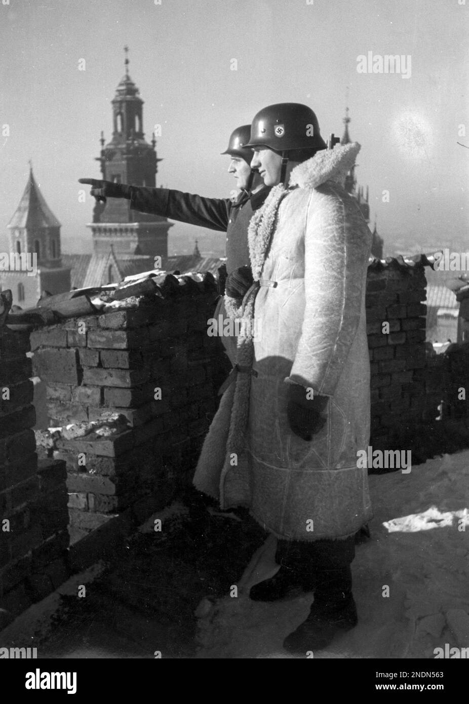 Two soldiers from the 10th SS Totenkopf regiment on guard duty on the roof of the Royal Castle in Kraków. SourceNac.gov.pl Stock Photo