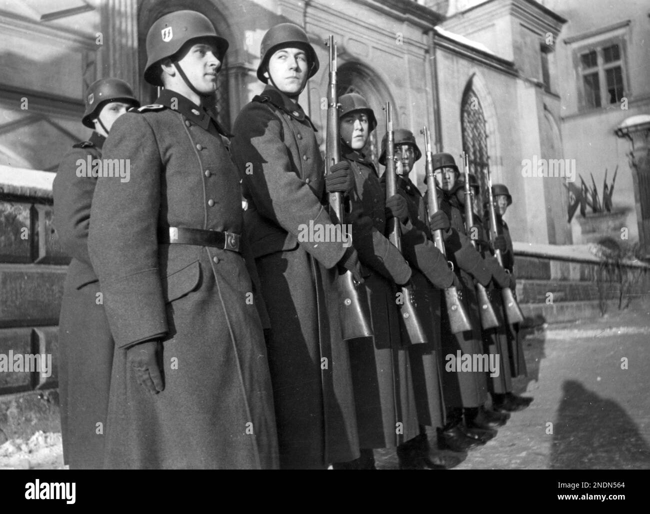 Soldiers of the 10th SS Totenkopf regiment during the changing of the guard at the Royal Castle in Krakow. SourceNac.gov.pl Stock Photo