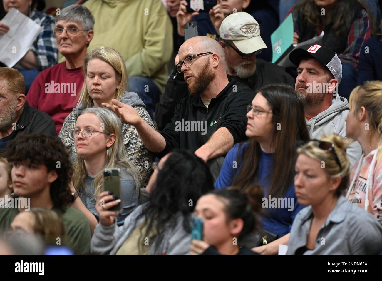 Members of the community gather to discuss their safety and other