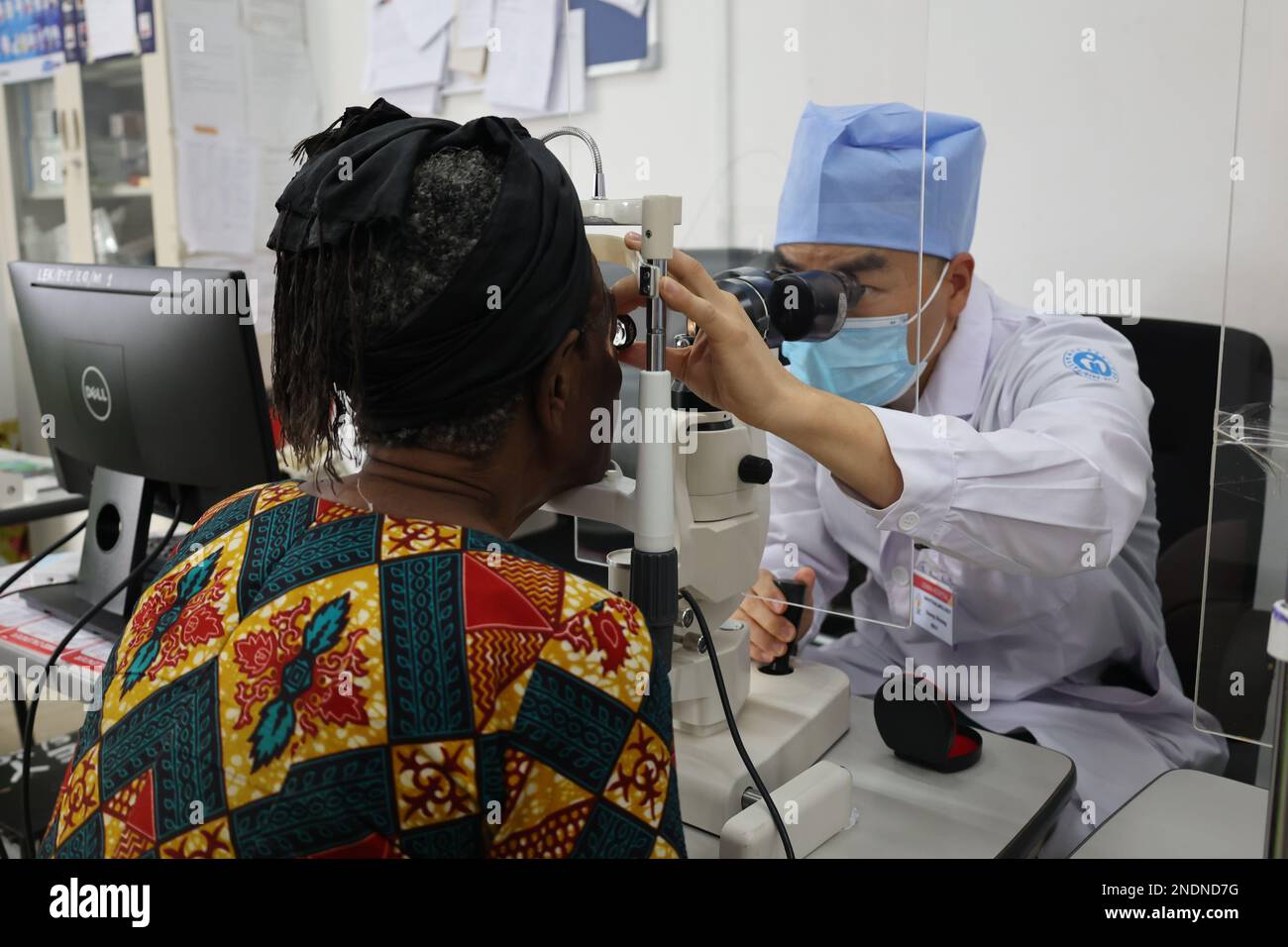Accra, Ghana. 13th Feb, 2023. A Chinese doctor (R) from the Chinese ...