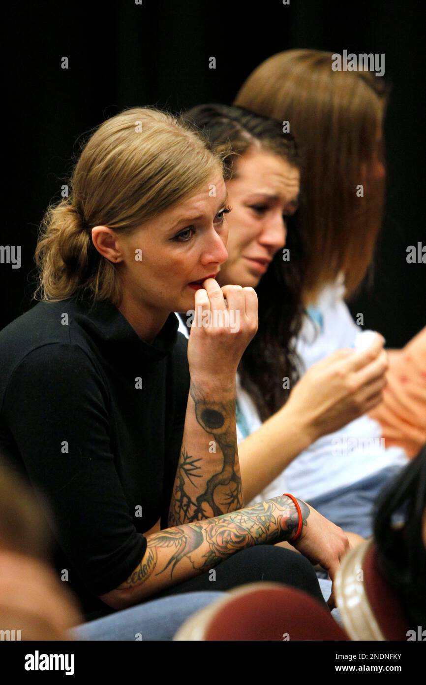 Family and friends of Slipknot band members react during a news