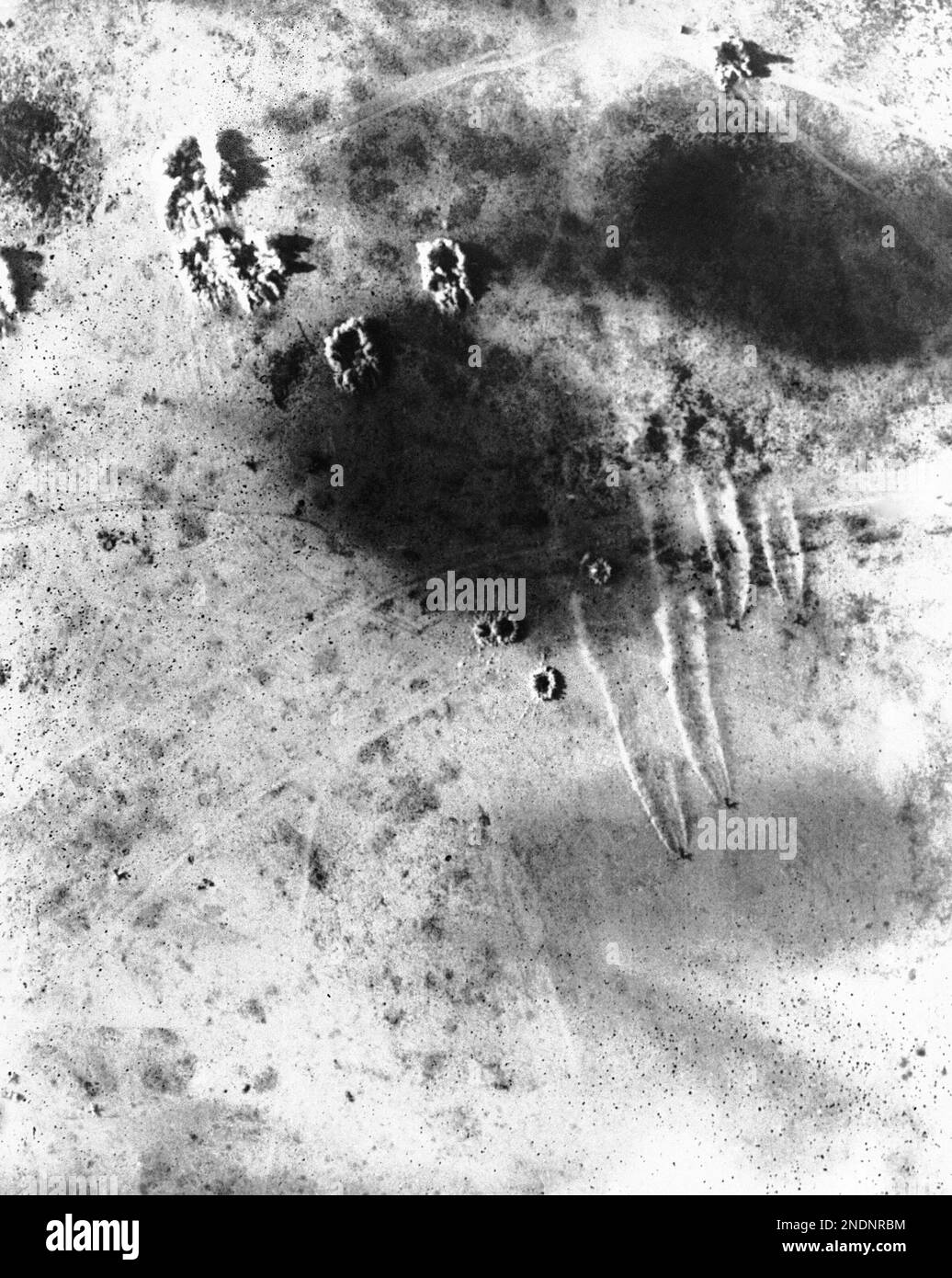 This view of an air raid on an Axis plane base at Martuba, near Derna ...