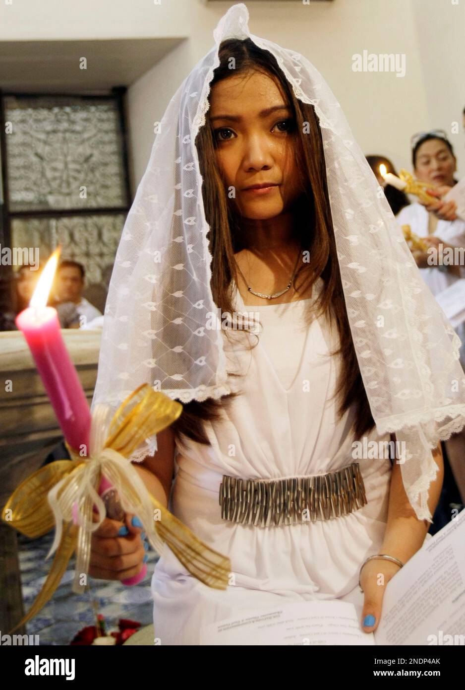 Filipino singing star Charice Pempengco wears a veil during her