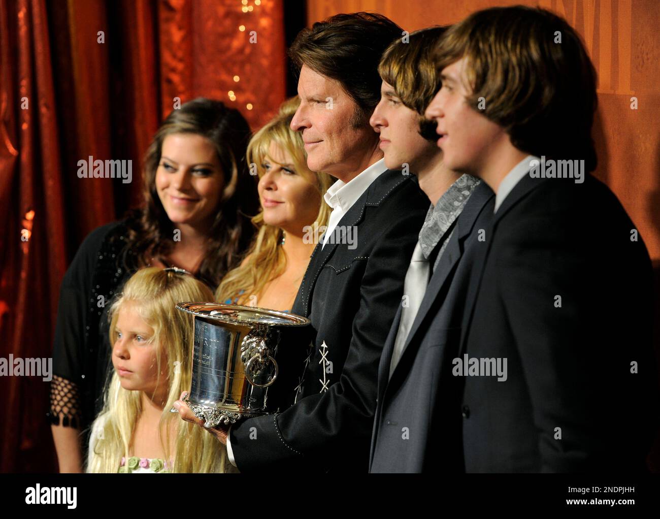 BMI Icon award recipient John Fogerty, center, poses with daughter