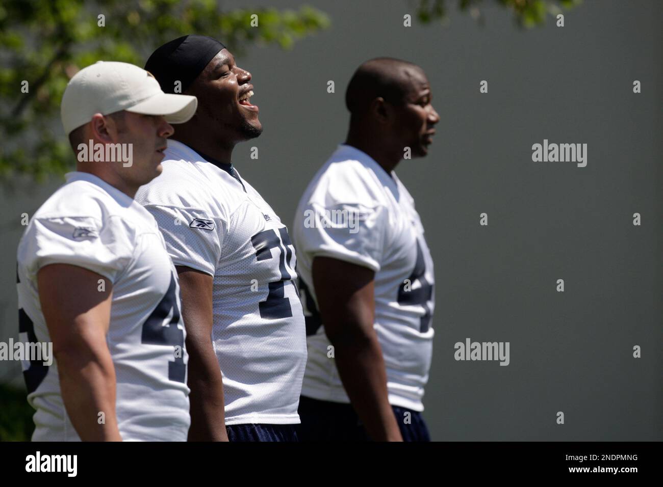 St. Louis Rams players, from left to right, Chris Massey, Mark Lewis ...
