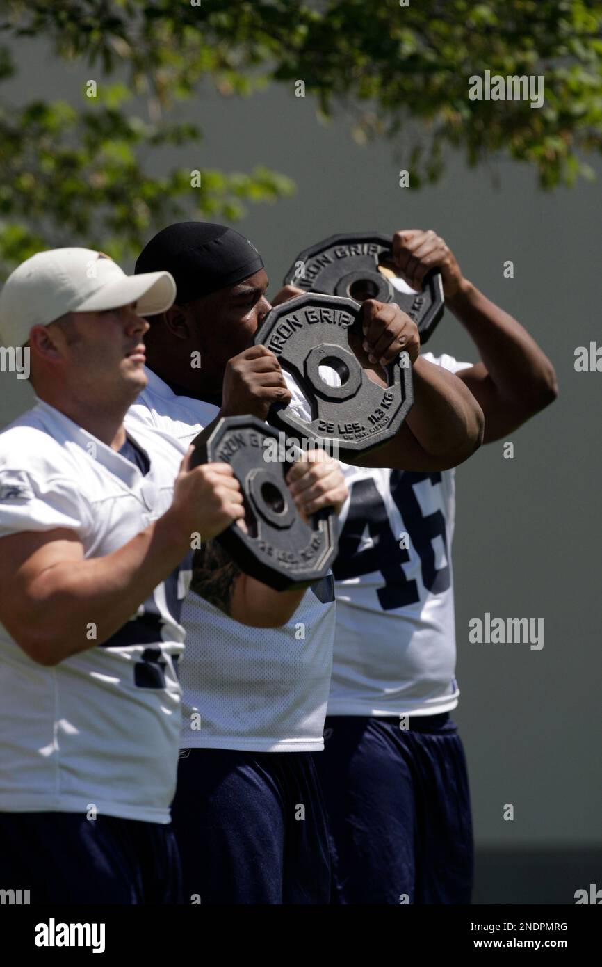 St. Louis Rams players, from left to right, Chris Massey, Mark Lewis ...
