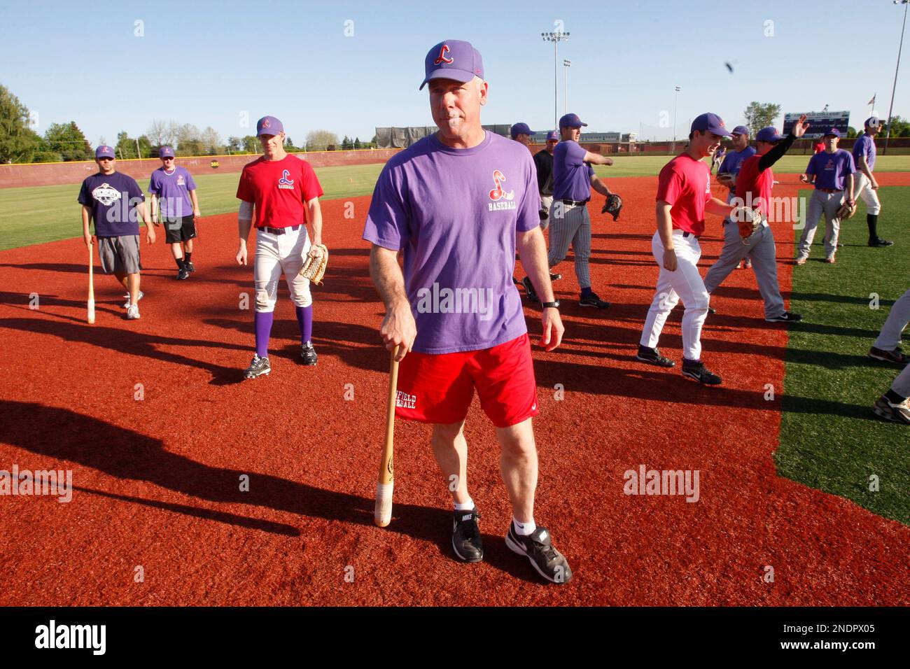Linfield baseball coach Scott Brosius throws during batting practice with  his team Friday, May 14, 2010, in McMinnville, Ore. Former Yankee Scott  Brosius is now Coach Brosius, guiding the baseball team of