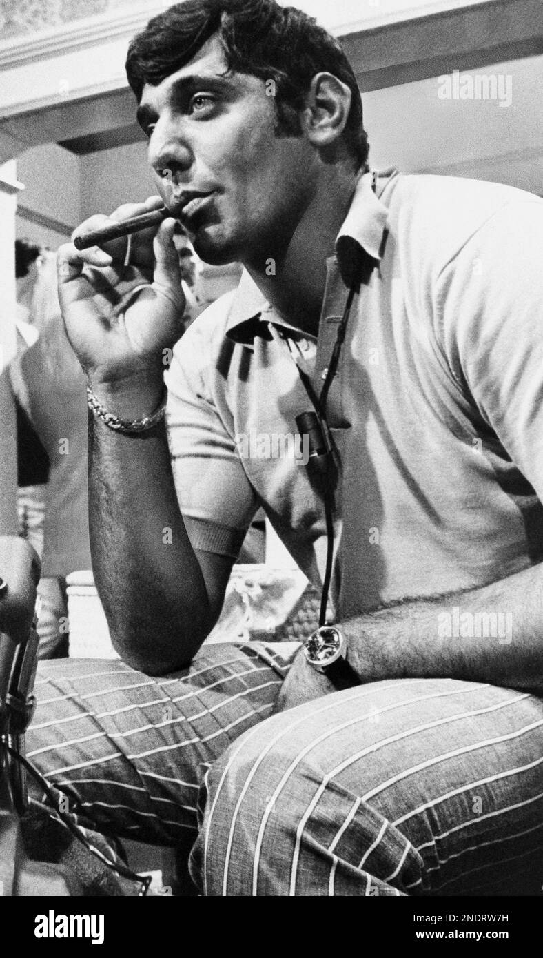Joe Namath, star quarterback of the New York Jets, sits with cigar in hand  on July 12, 1969 where he was performing in a movie. Namath was rumored on  Friday to have