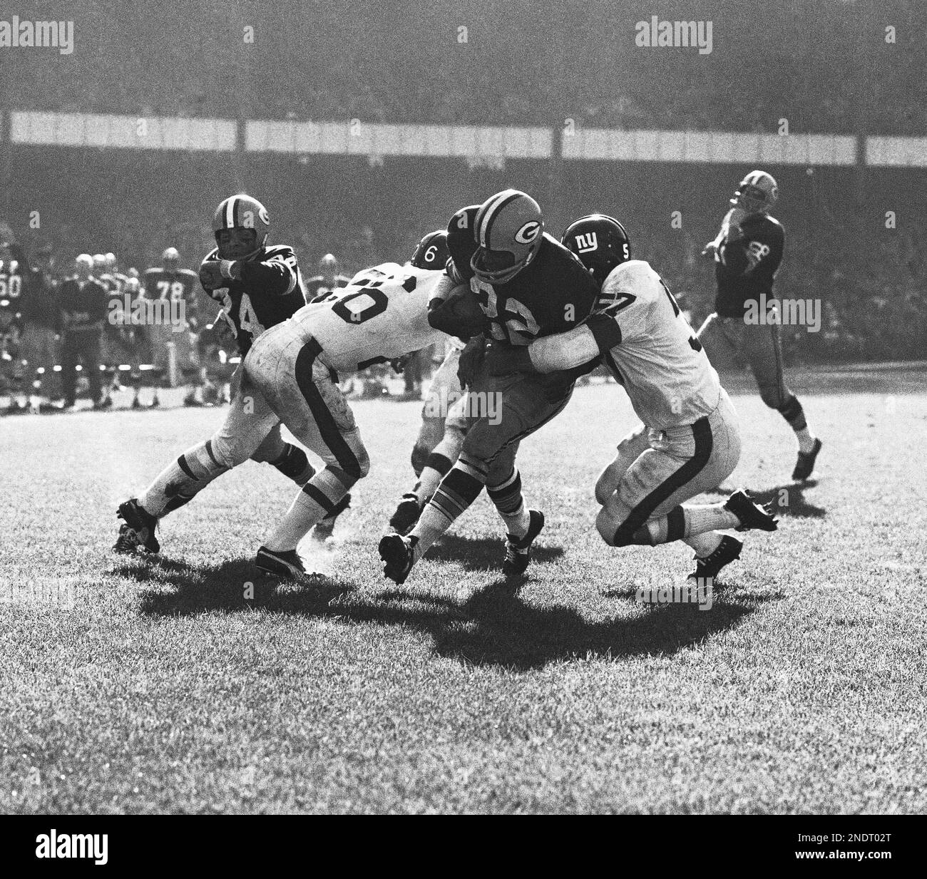 Green Bay Packers Elijah Pitts (22) moves for small gain against Detroit  Lions in a season opener, Sept. 18, 1967, Green Bay, Wisc. Lions Wayne  Walker (55) and some of his buddies