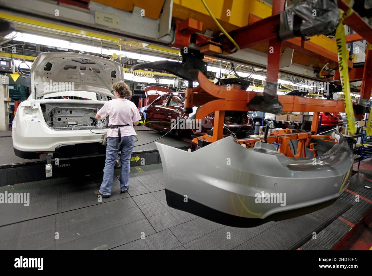 Workers man the assembly line of Ford Motor Companies Chicago Assembly Plant,  Tuesday, Jan. 26, 2010, in Chicago as Ford announced that it will produce  the next generation Ford Explorer SUV at