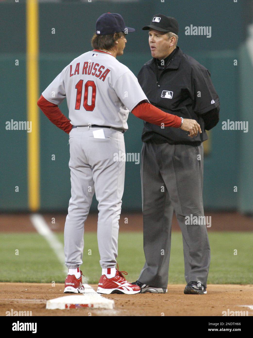 St. Louis Cardinals manager Tony La Russa (10) argues with first base