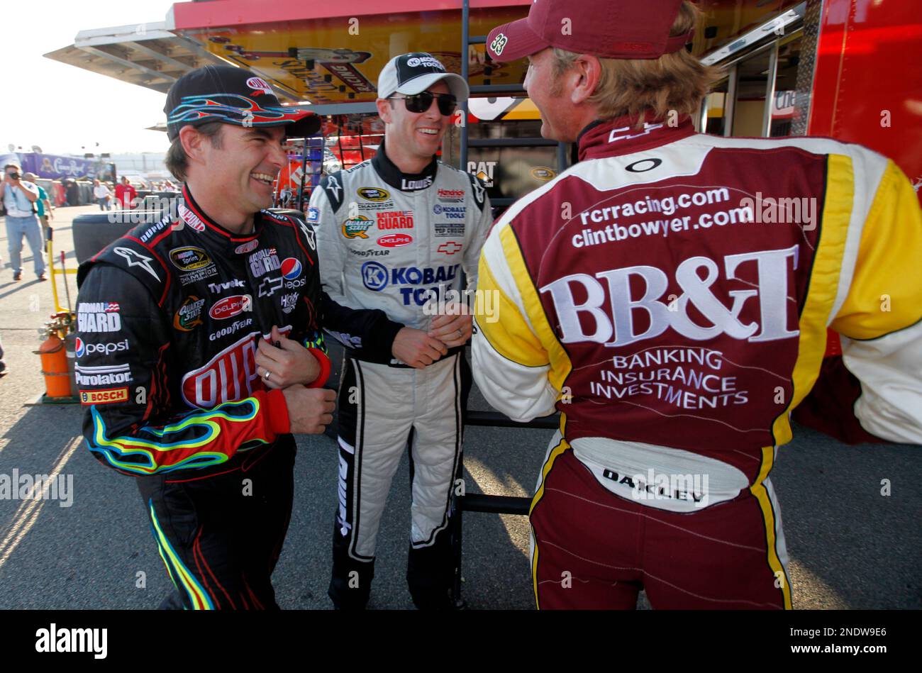 NASCAR drivers Jeff Gordon, left, and Jimmie Johnson, Center, joke with ...