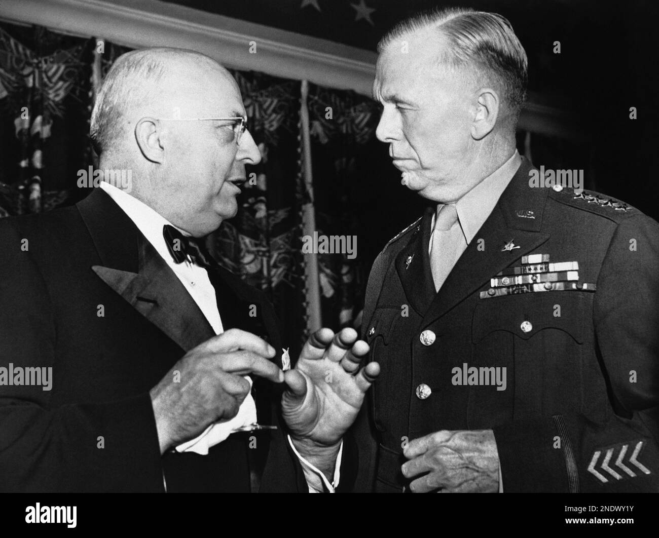Henry J. Kaiser, West Coast shipbuilder, left, and General C