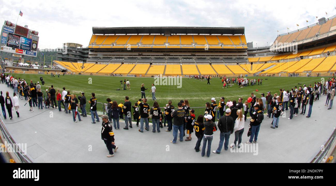 In this image made with a fisheye lens, some fans attending the