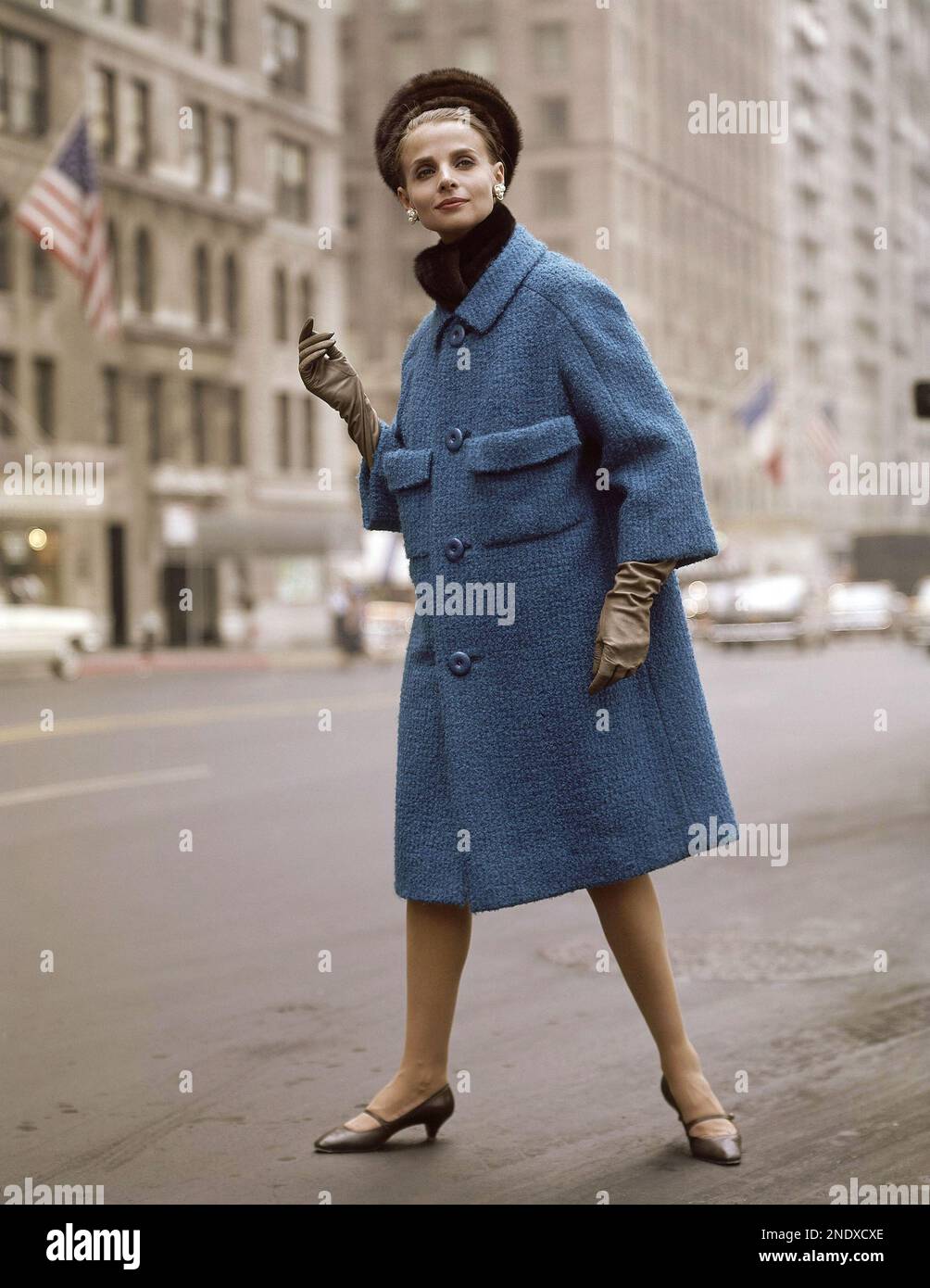 blue coat with black shoes