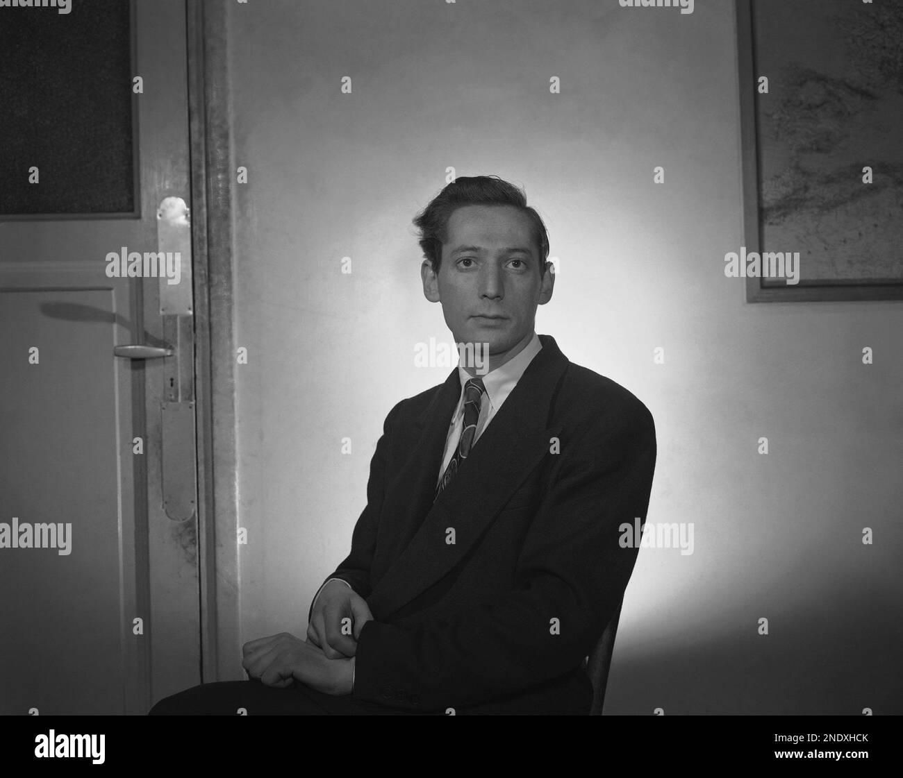 Jean-Jacques Levy, employed as a photographer at the Associated Press Paris  Newsphoto office, Feb. 9, 1950. (AP Photo Stock Photo - Alamy