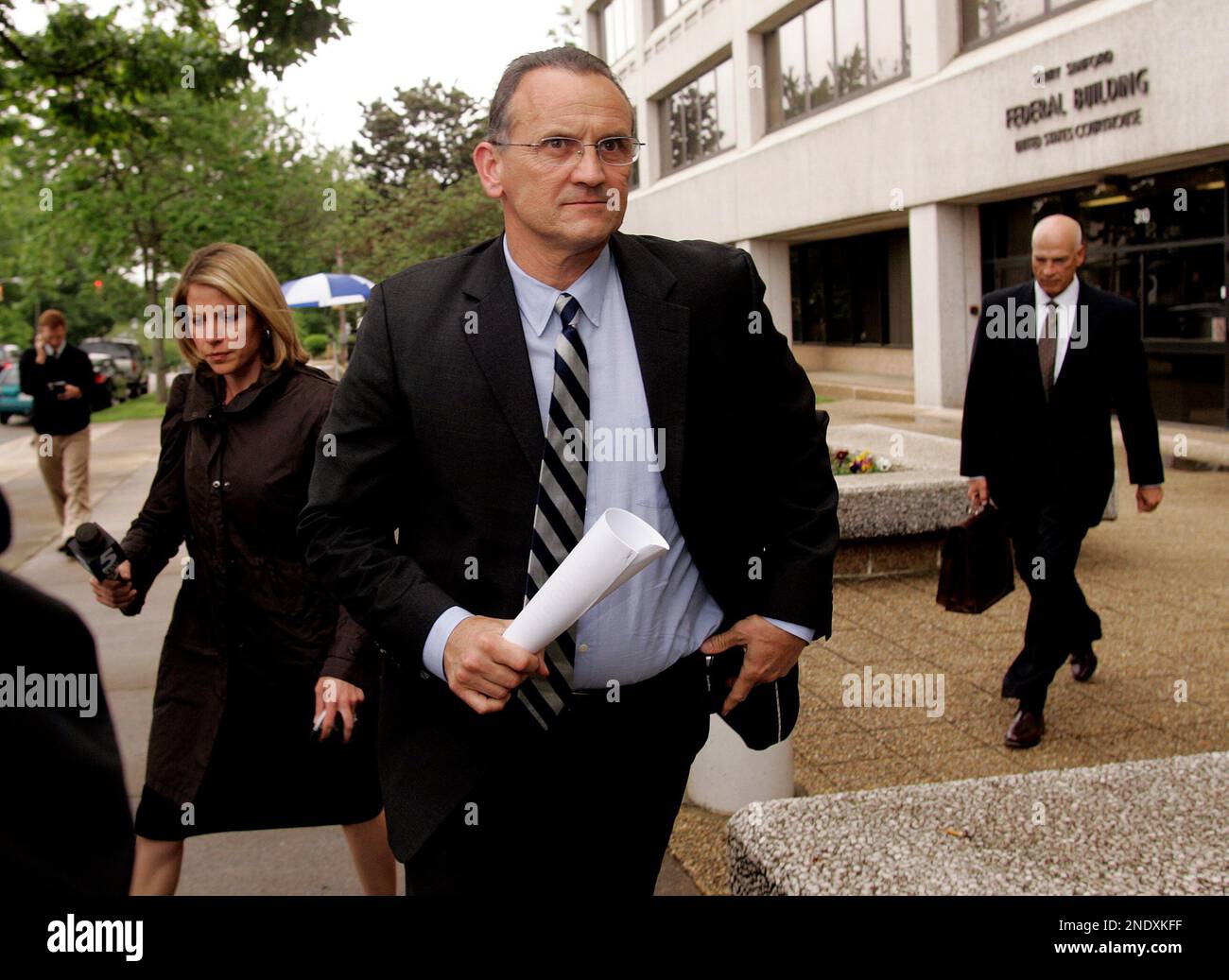 Gary Jackson former president of Blackwater, the company now known as Xe Services, leaves the Terry Sanford Federal Building and Courthouse in Raleigh, N.C., Wednesday, April 21, 2010. (AP Photo/Jim R. Bounds) Stock Photo