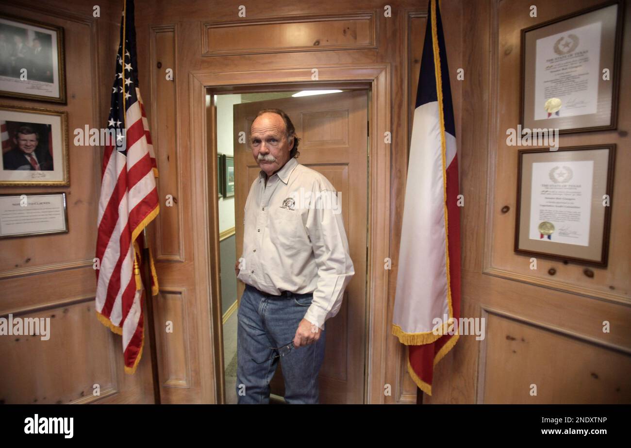 Attorney Ernest Cannon walks through a doorway at his law office in