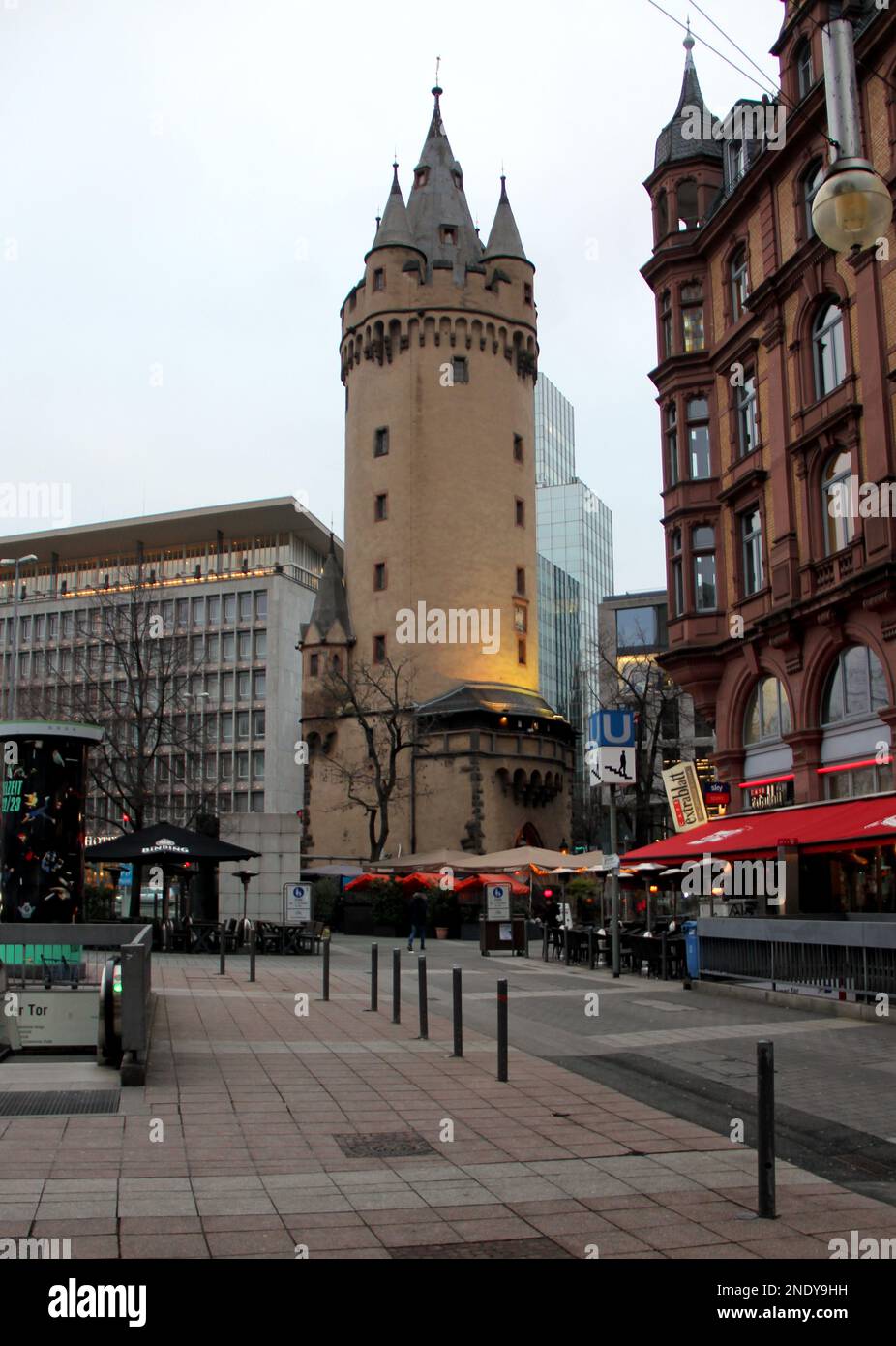 Eschenheimer Turm, late-medieval city gate tower, erected at the beginning of the fifteenth century, view in early evening light, Frankfurt, Germany Stock Photo
