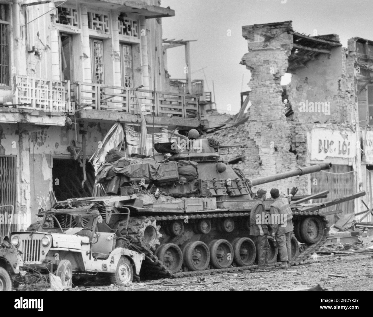 U.S. Marine tank guards residential section of Hue in South Vietnam on