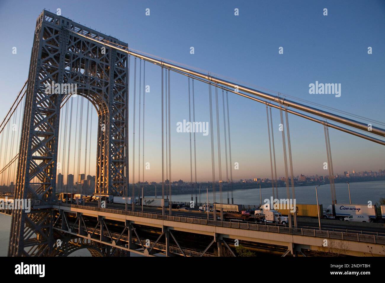 A steel beam salvaged from the World Trade Center is transported across