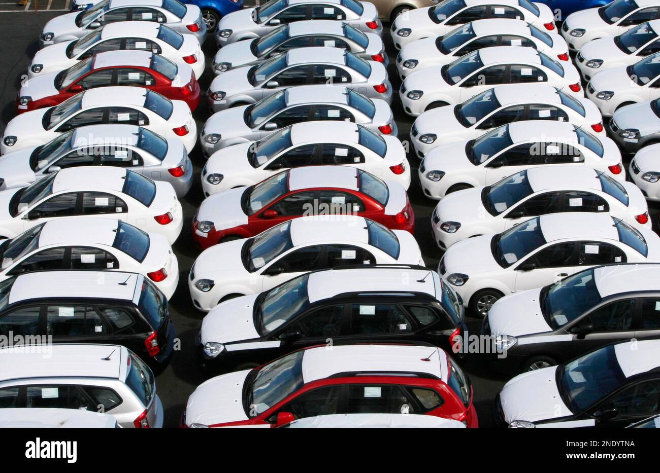 South Korean KIA sedans and SUVs wait to be transported to car plants