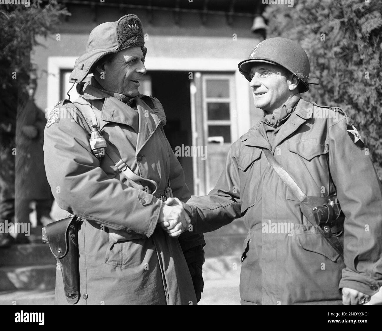 General Matthew B. Ridgway congratulates General Peploe, Co of 35th ...