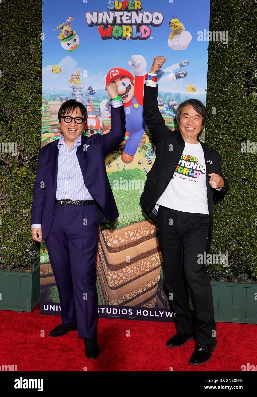 Nintendo Representative Shinya Takahashi, left, senior managing executive officer of Nintendo ...