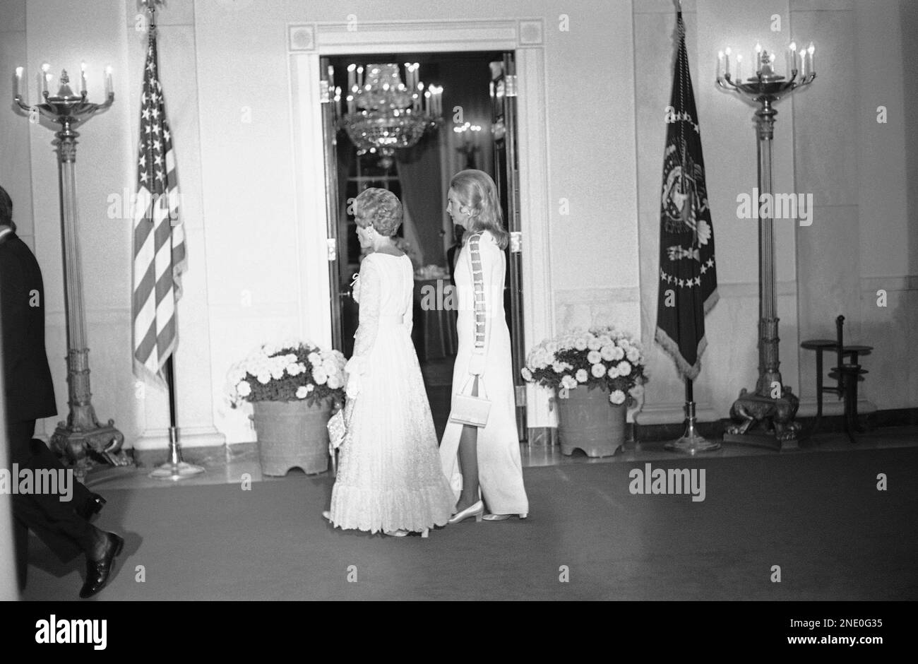 Sonia McMahon, wife of Australian Prime Minister William McMahon, wears a doublesplit white