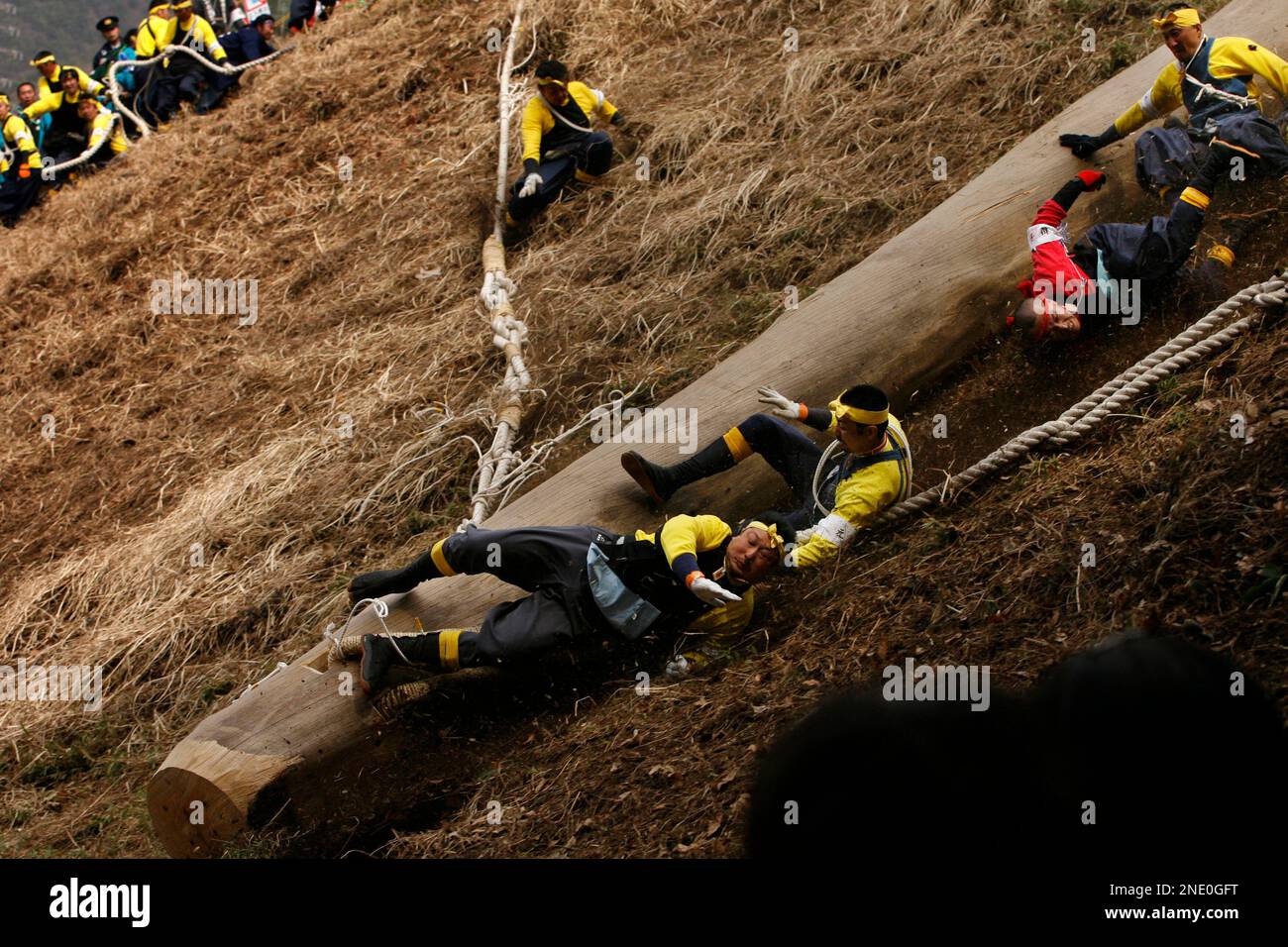 Shrine parishioners fall off a log called 