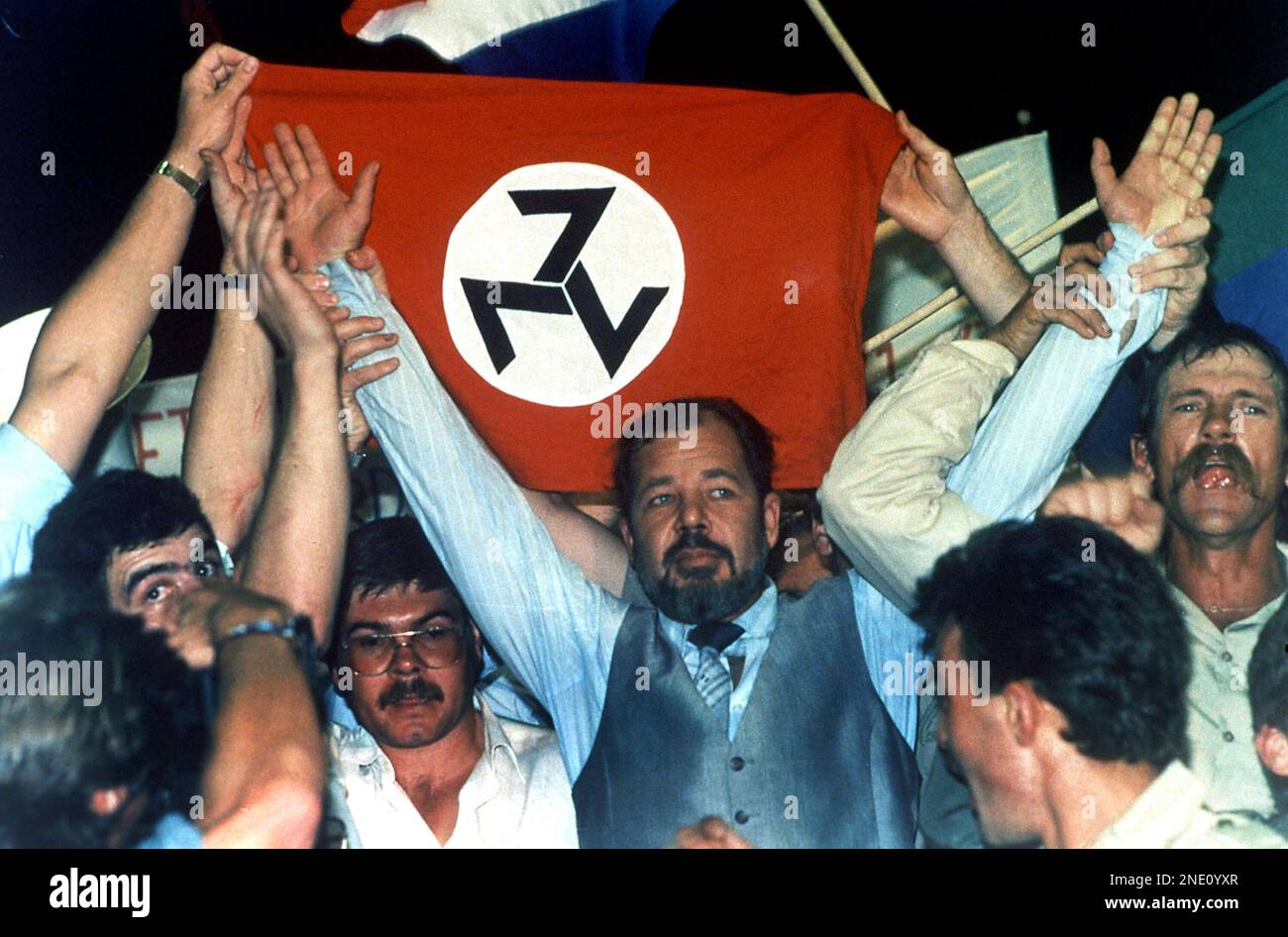 Supporters of the Afrikaner Resistance Movement (AWB) display an