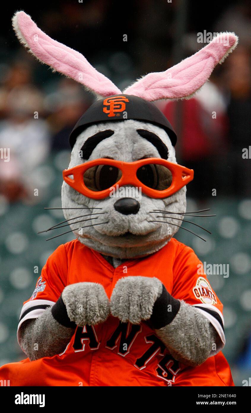 San Francisco Giants' mascot Lou Seal, clad in bunny ears for