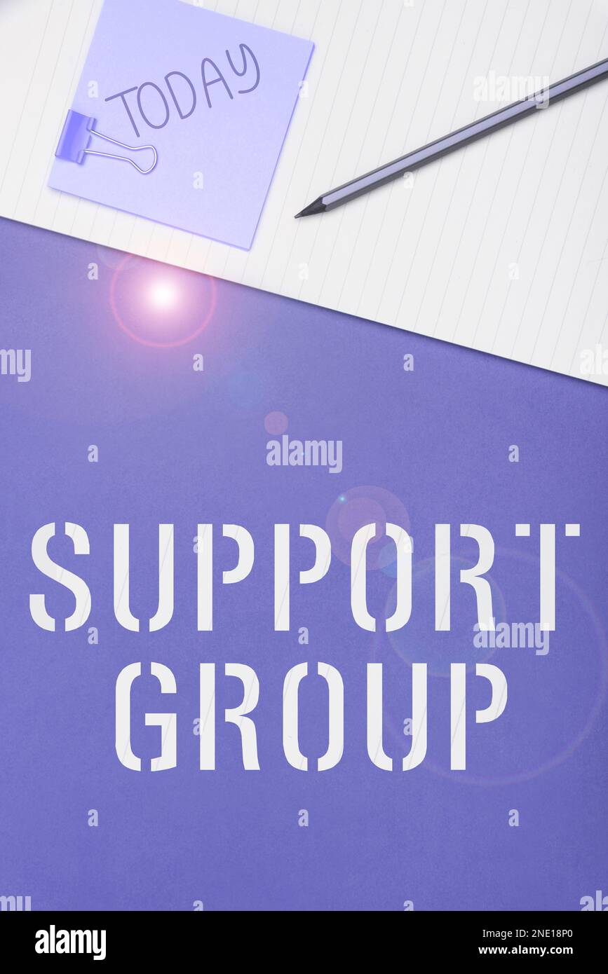 Sign displaying Support Group. Business overview number of people ...