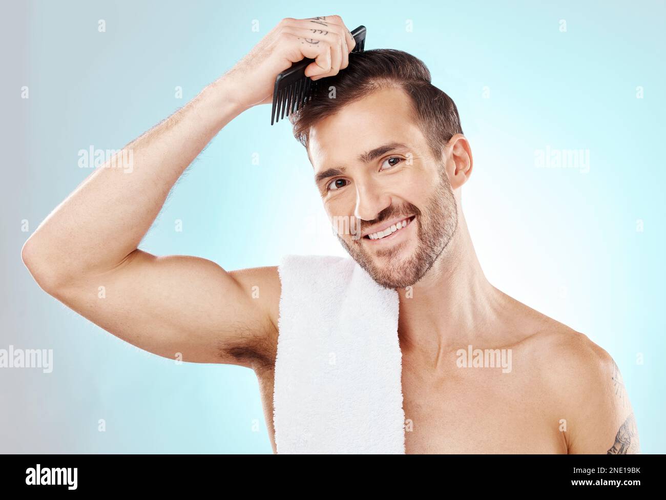 Hair care, man in portrait and beauty with comb and grooming with hygiene on blue background