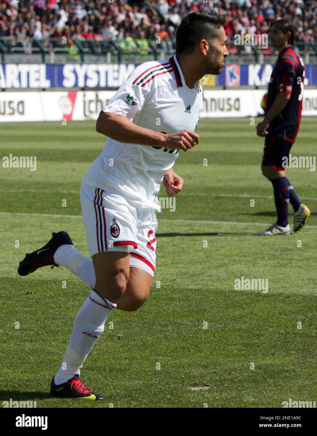 AC Milan striker Marco Borriello celebrates after scoring during