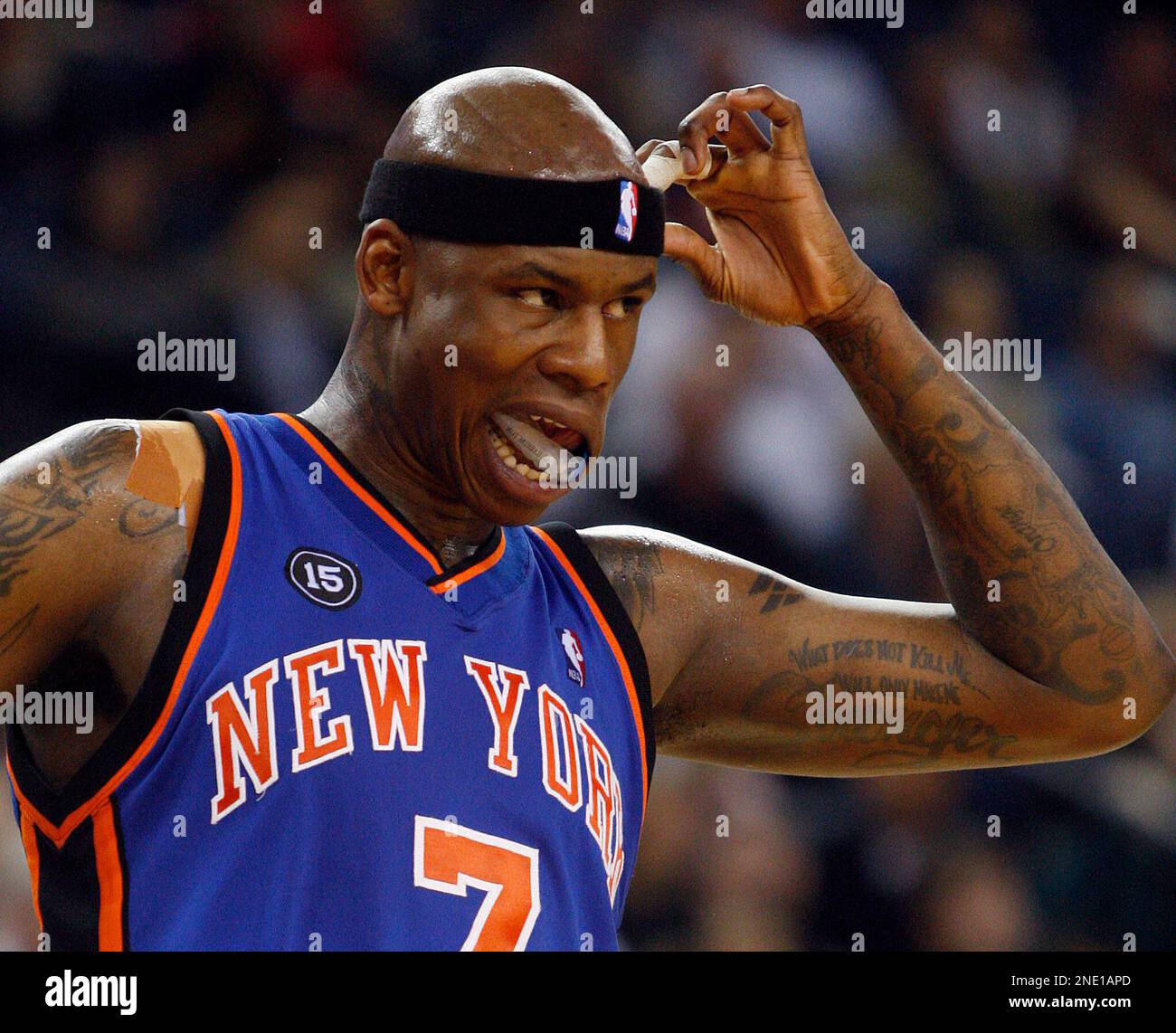 New York Knicks' Al Harrington adjusts his headband during the fourth  quarter of an NBA basketball game against the Golden State Warriors  Saturday, April 2, 2010, in Oakland, Calif. (AP Photo/Ben Margot