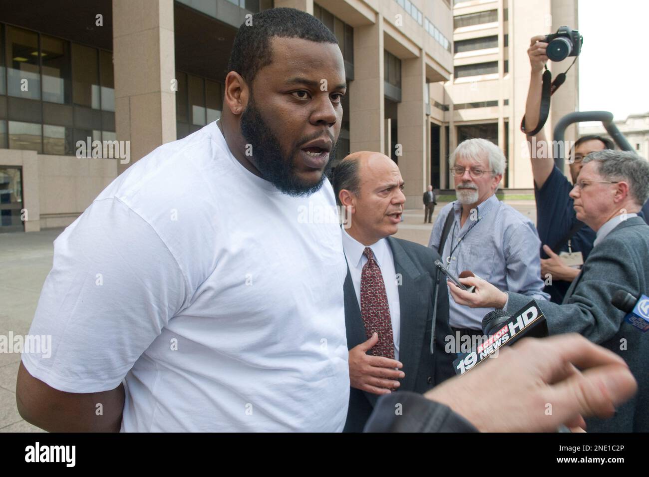 Cleveland Browns nose tackle Shaun Rogers and his lawyer Patrick D