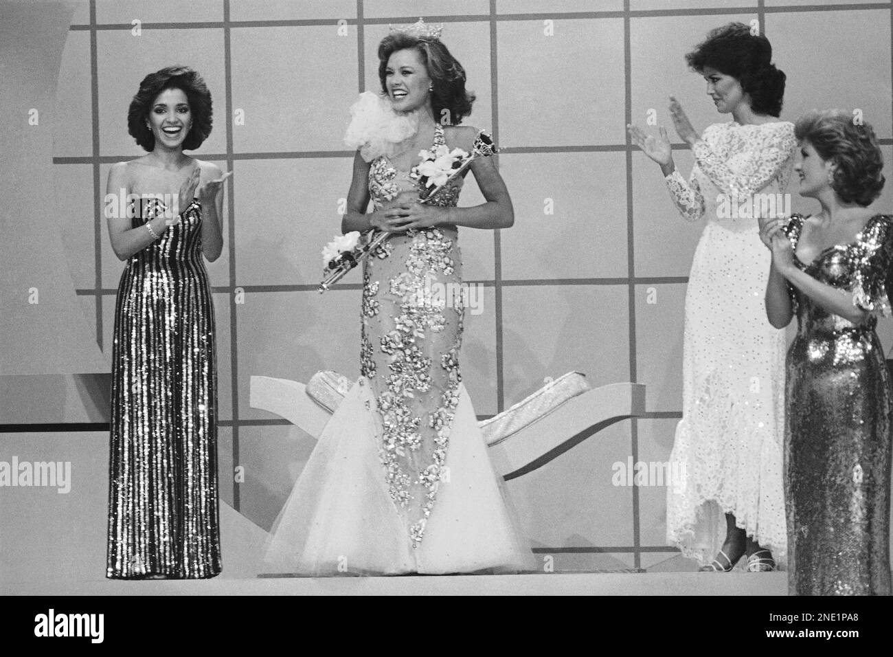 Suzette Charles, Miss New Jersey, the first runner up, applauds the