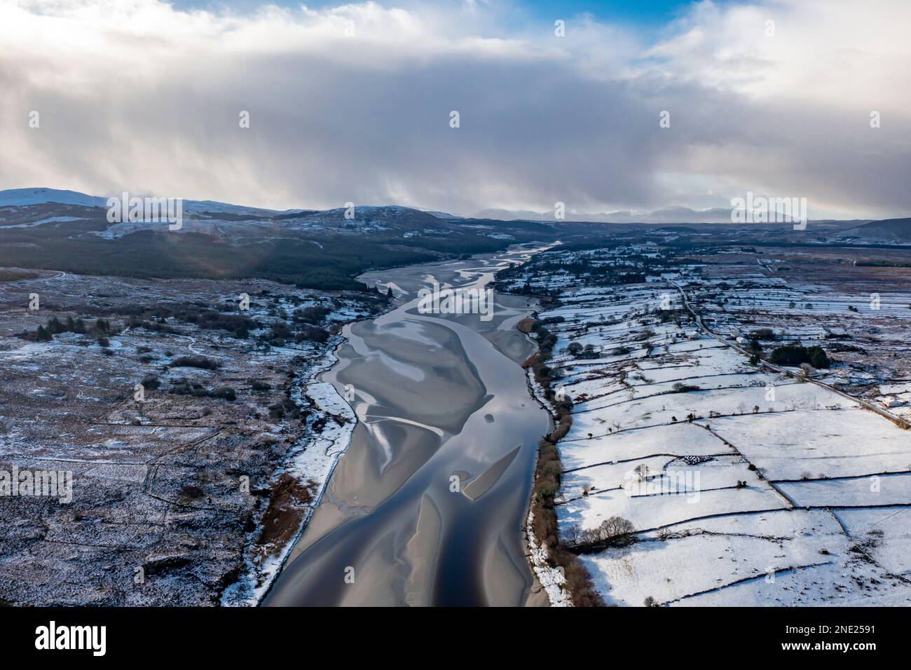 Aerial view of snow covered Gweebarra River between Doochary and Lettermacaward in Donegal - Ireland. Stock Photo