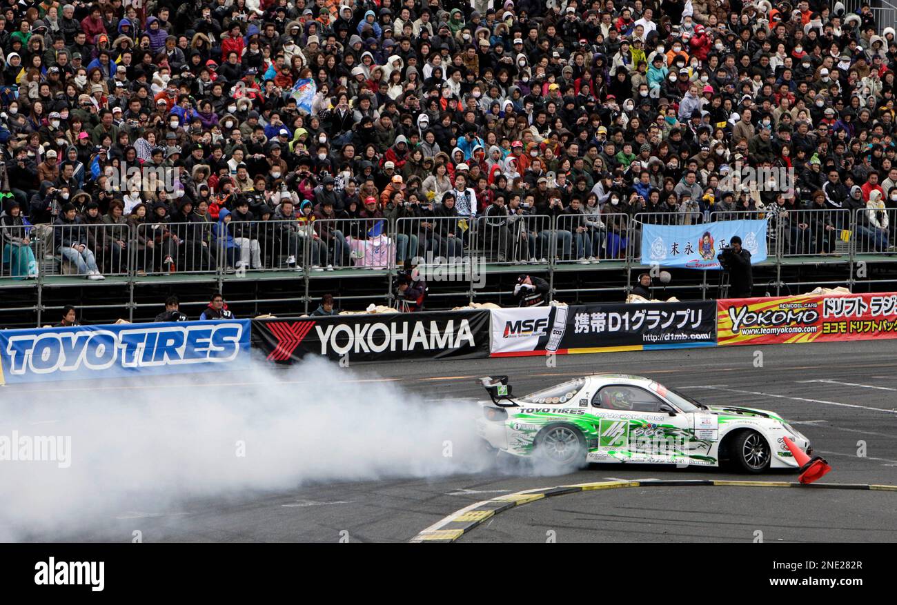 Masao Suenaga smokes his tires during the Tokyo Drift All Star event in the  D1 Grand Prix series in Tokyo, Sunday, March 28, 2010. The event was the  first round of the