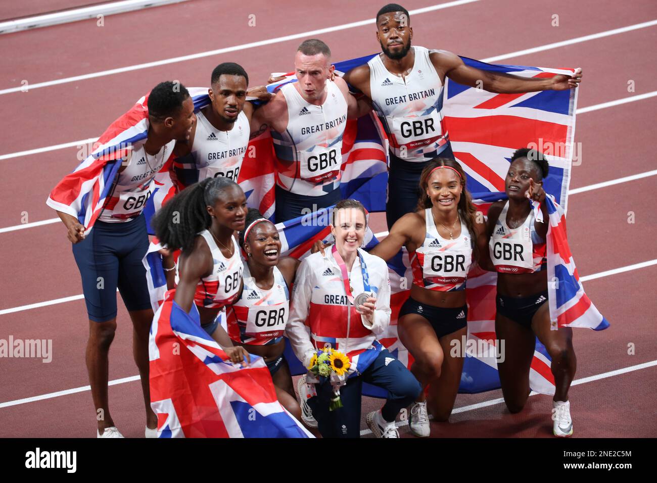 AUG 06, 2021 - Tokyo, Japan: Team Great Britain 4x100 men and women relay as well as Laura Muir celebrate their achievements at the Tokyo 2020 Olympic Games (Photo: Mickael Chavet/RX) Stock Photo