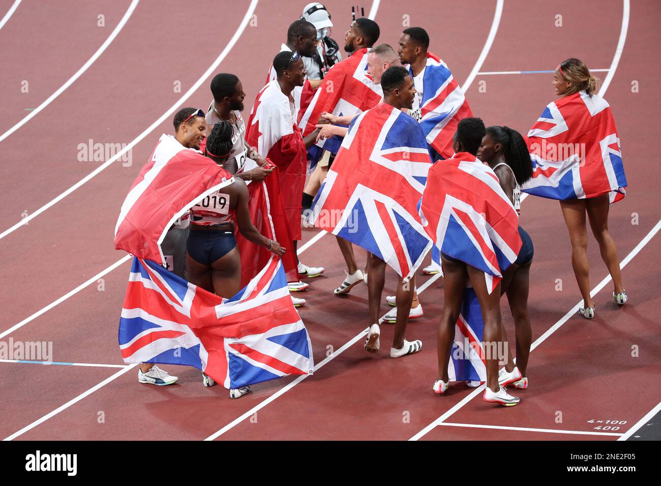 AUG 06, 2021 - Tokyo, Japan: Team Great Britain 4x100 men and women relay as well as Laura Muir celebrate their achievements at the Tokyo 2020 Olympic Games (Photo: Mickael Chavet/RX) Stock Photo