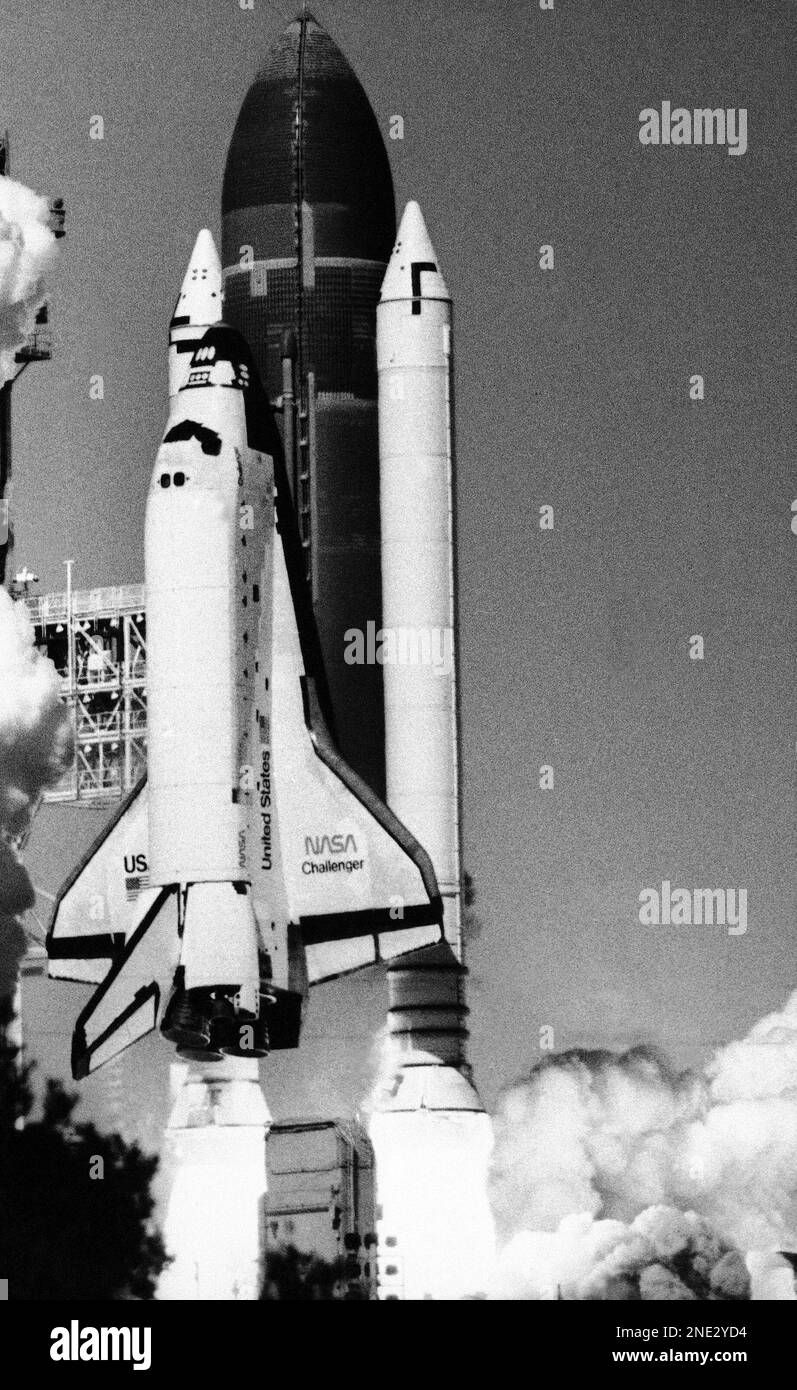 The Space Shuttle Challenger is seen as it lifts off the pad on its ...