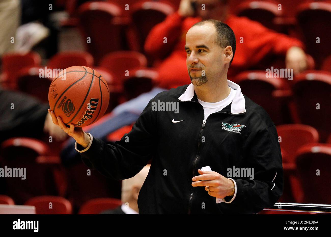 WisconsinGreen Bay coach Matt Bollant throws a ball to one of his