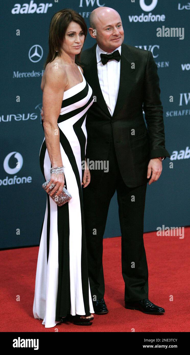Romanian gymnast Nadia Comaneci, left, arrives with her husband for the