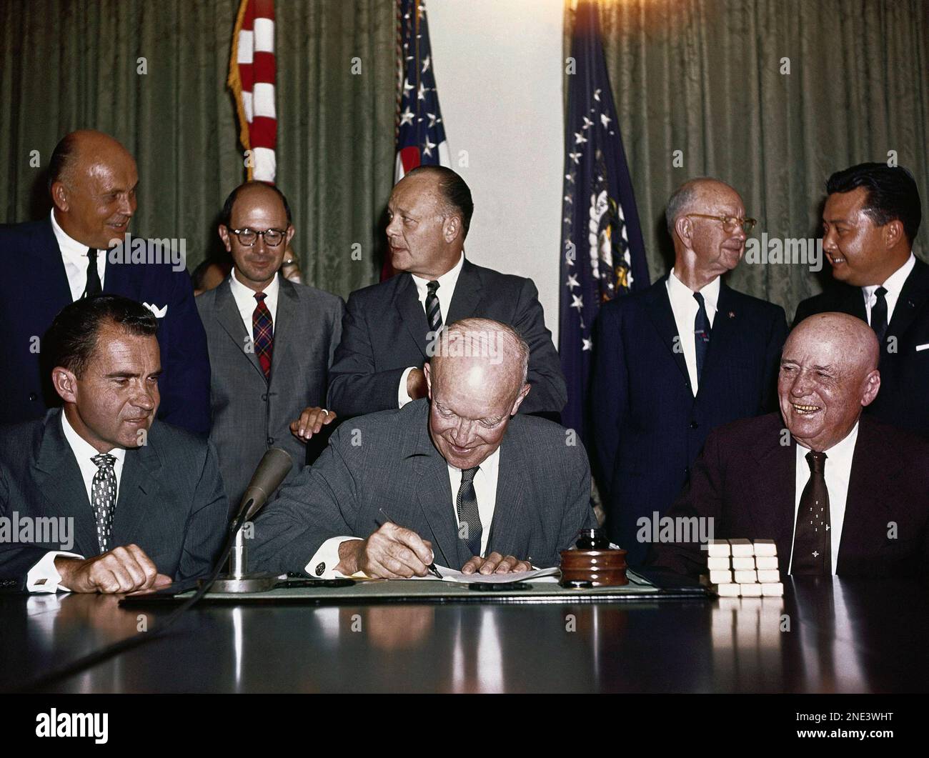 President Dwight D. Eisenhower, signing proclamation Hawaii statehood ...