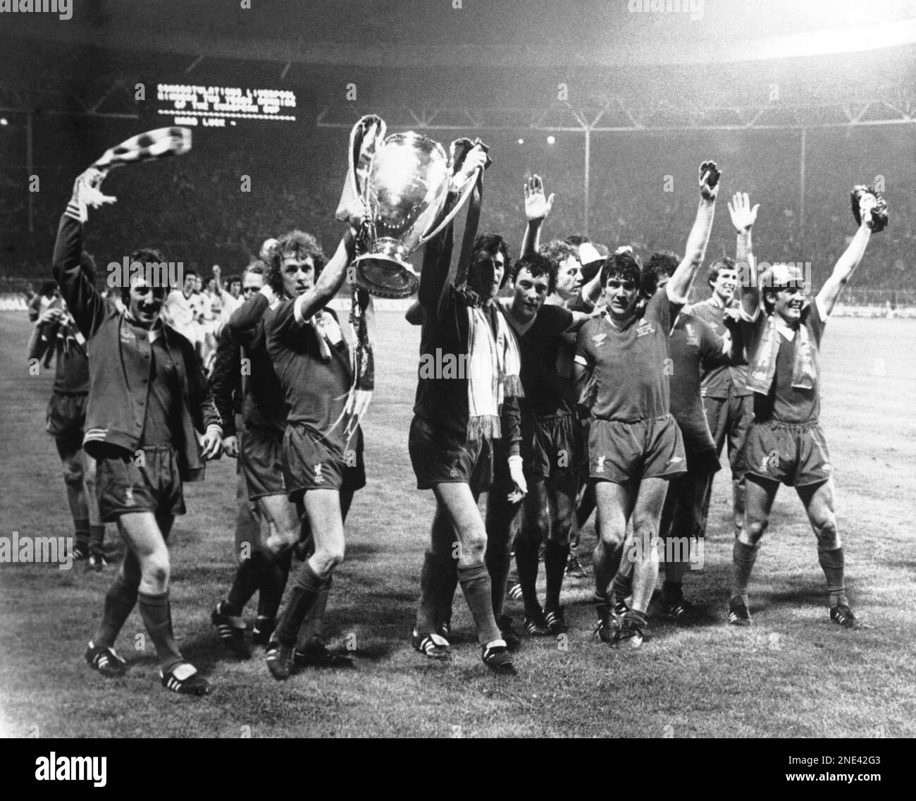 the-liverpool-team-run-round-with-the-european-cup-at-london-s-wembley