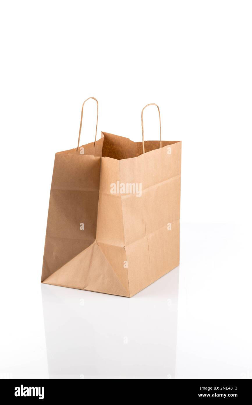 Recycled paper kraft shopping bag. This package bag isolated on white