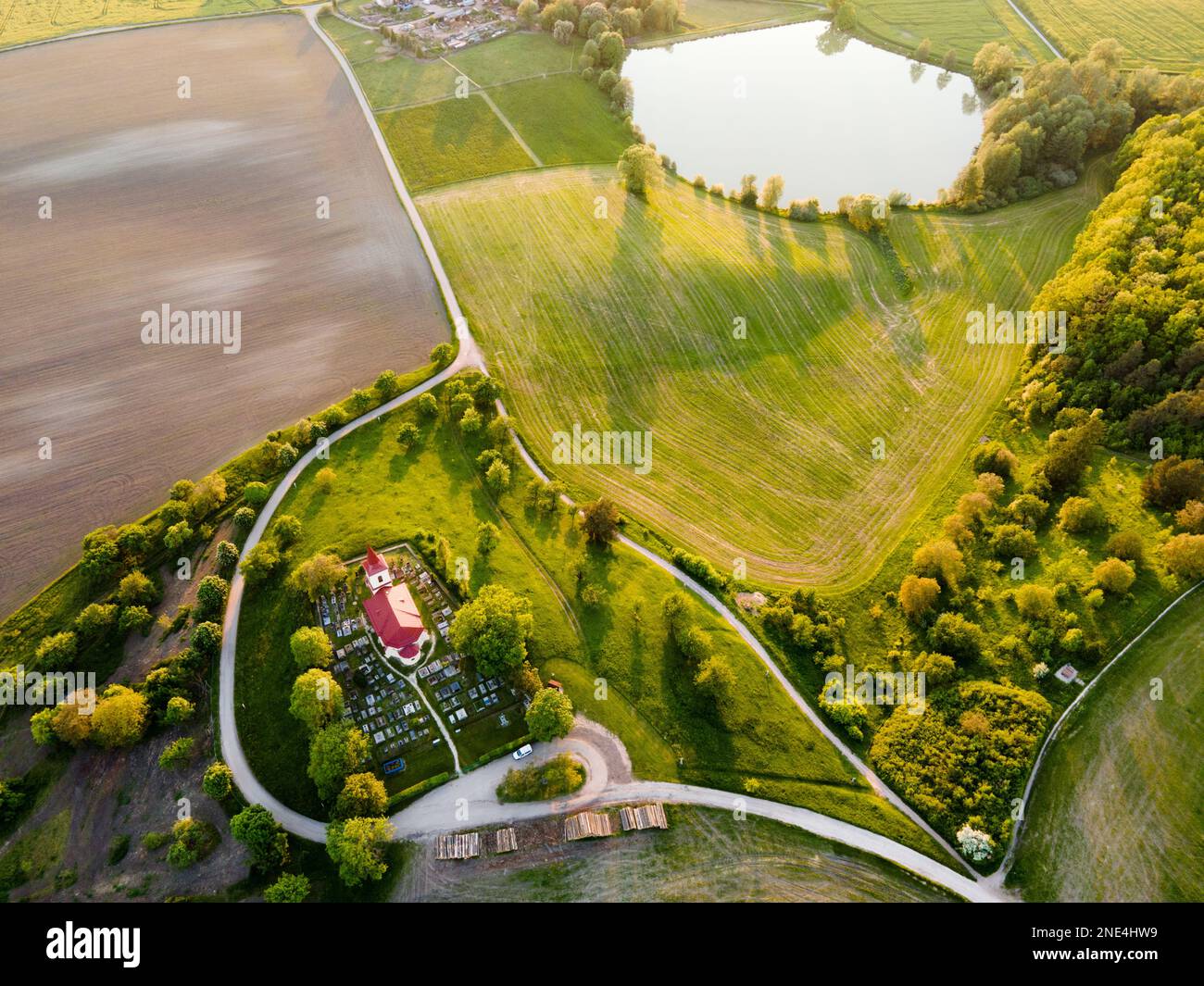 An aerial view of a countryside church in summer Stock Photo - Alamy