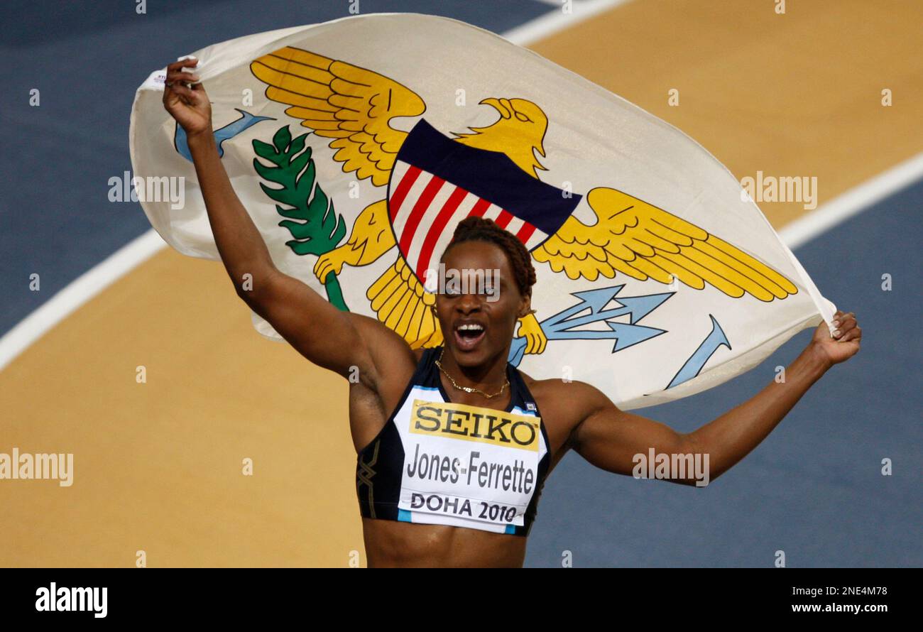 LaVerne JonesFerrette of Virgin Islands celebrates winning the silver
